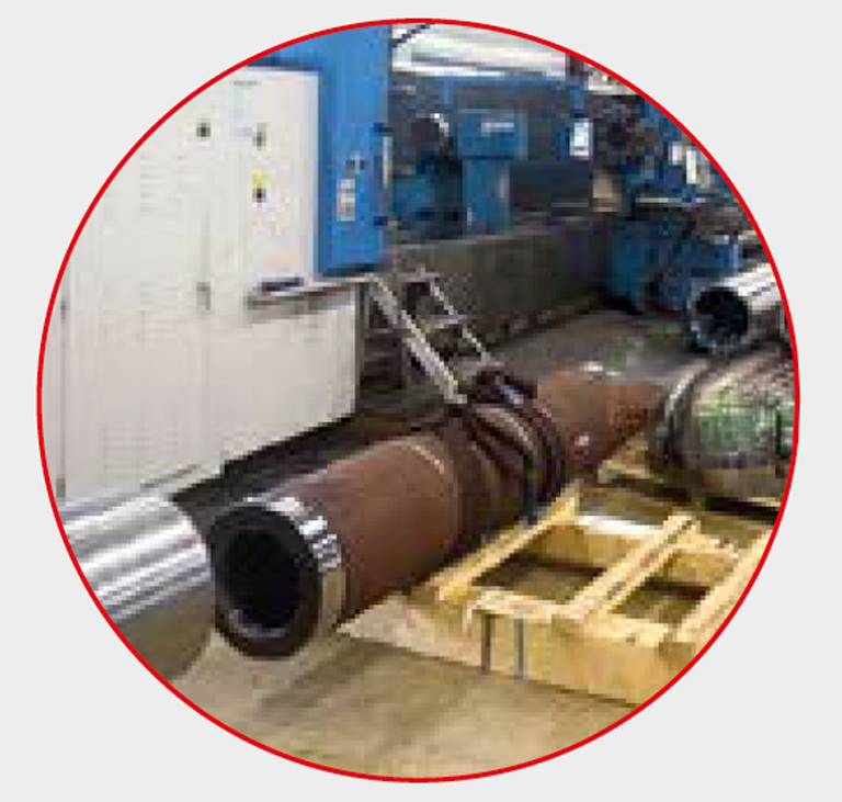 The solid steel rods are machined into hollow cylinders The solid steel rods are machined into hollow cylinders