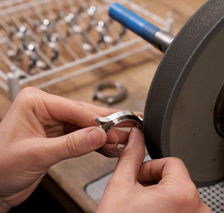 Grinding and polishing is used to achieve a smooth and uniform surface.