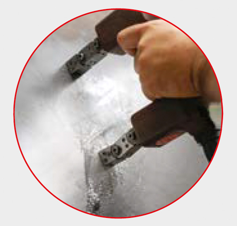 Gears are inspected using magnetic particle inspection to check for any cracks.